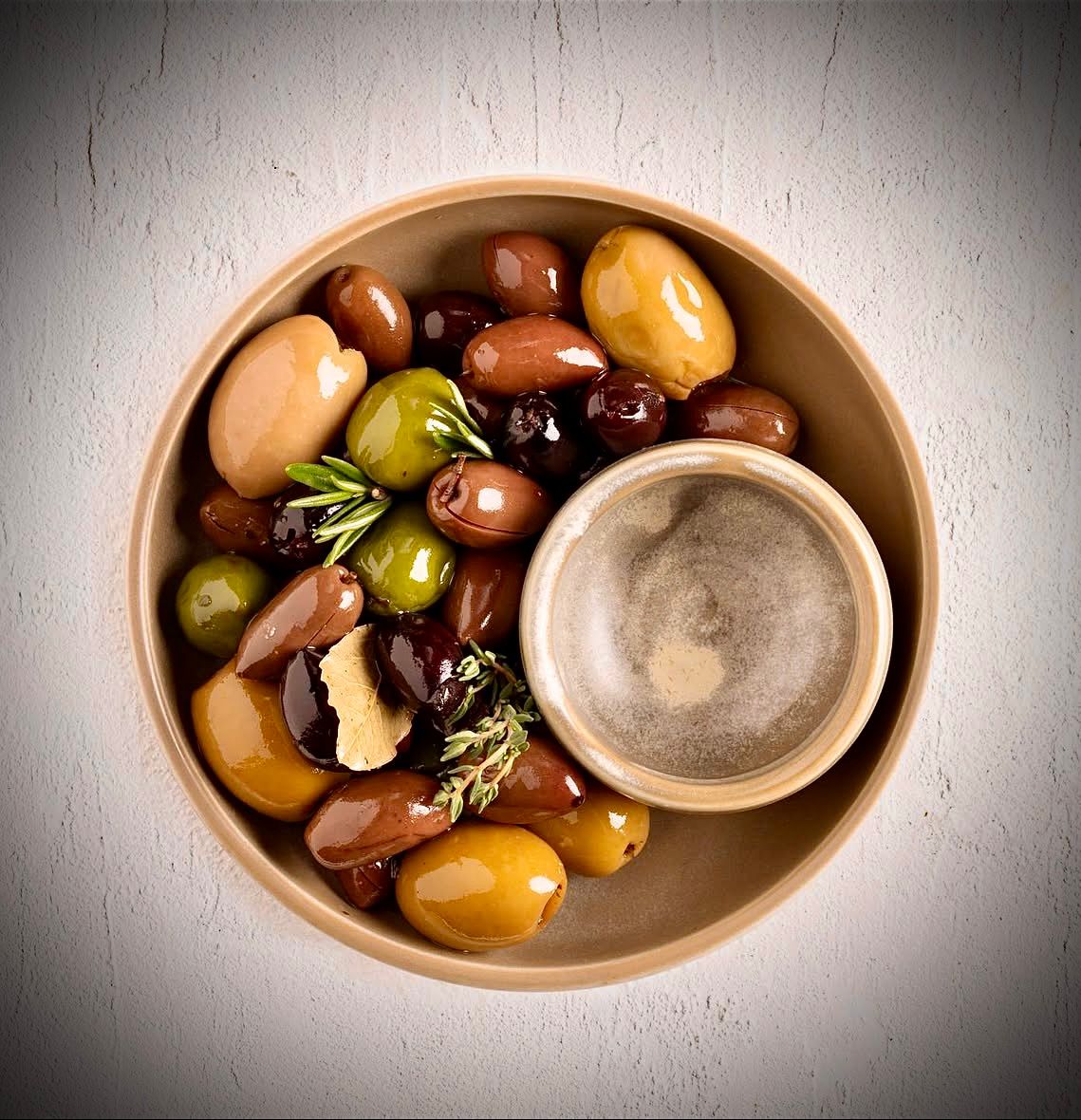 Marinated olives — fine dining detail for private jet catering London